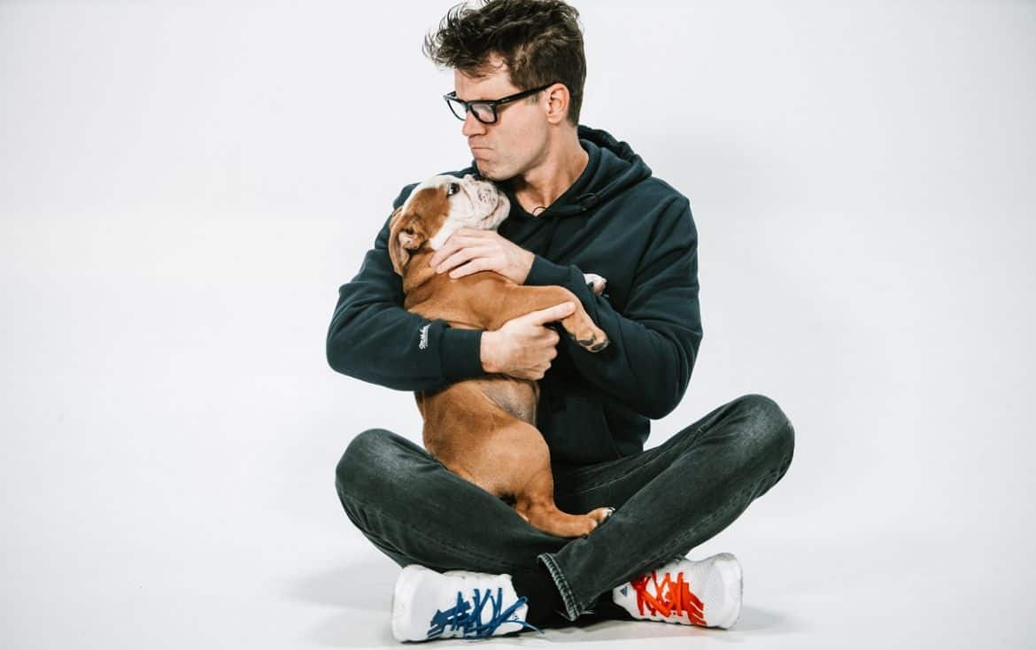 Bobby Bones Answers Interview Questions While Playing With His Puppy ...