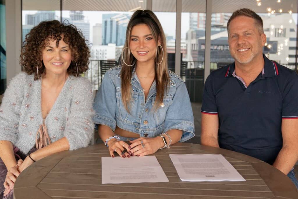 Photo ID (L-R): Manager Sherrie' Austin, Alison Nichols, President, Frontline Recordings, BMG North America Jon Loba