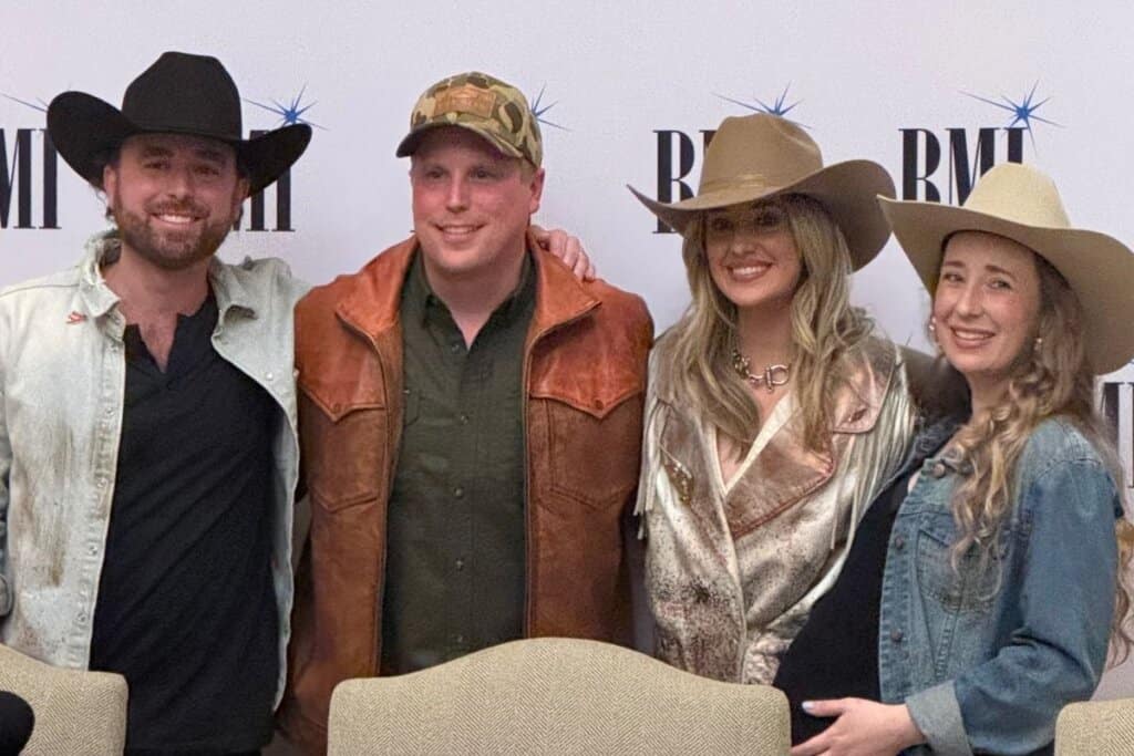 Dallas Wilson, Andy Albert, Lainey Wilson, Trannie Anderson celebrate "Somewhere Over Laredo" going No. 1 at country radio