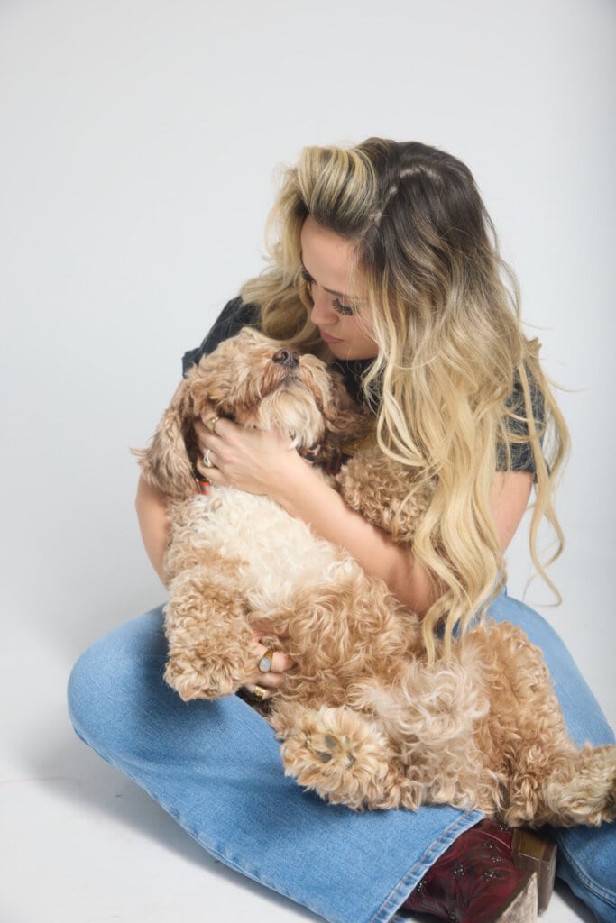 Priscilla Block with Huck; Photo by Osprey Media