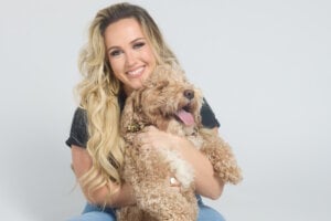 Priscilla Block with Huck; Photo by Osprey Media