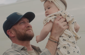 Cole Swindell with Daughter Rainey Gail; Photo via YouTube