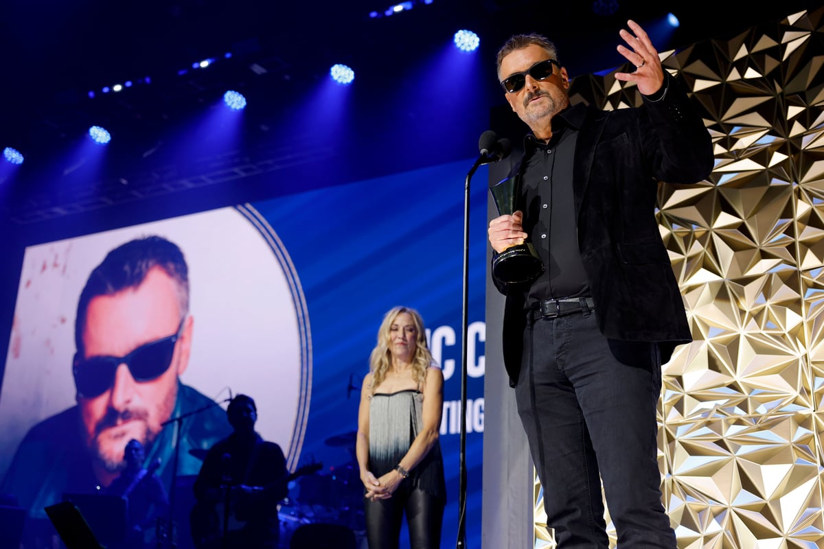 Eric Church accepts the ACM Icon Award onstage from Sheryl Crow (L) during the 19th ACM® Honors™ at The Pinnacle on August 19, 2026 in Nashville, Tennessee; Photo by Jason Kempin/Getty Images for ACM