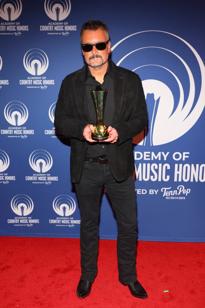 Eric Church poses backstage after accepting the ACM Lifting Lives Award during the 19th ACM® Honors™ at The Pinnacle on August 19, 2026 in Nashville, Tennessee; Photo by Terry Wyatt/Getty Images for ACM
