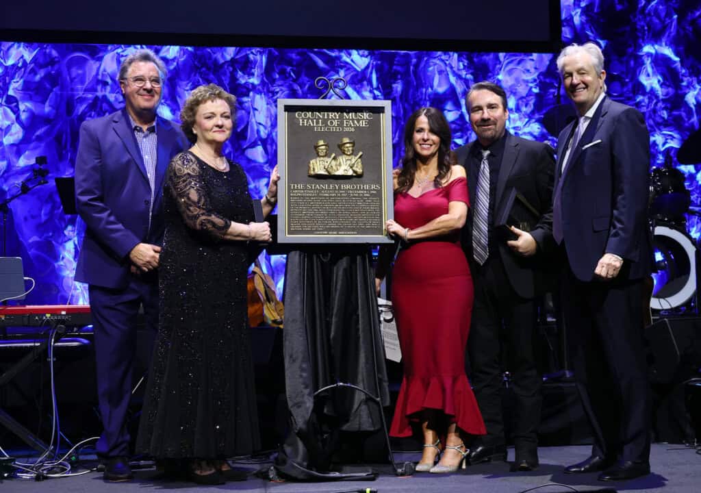 Vince Gill, Jeanie Stanley, Lisa Stanley, Ralph Stanley II and Museum CEO, Kyle Young speak onstage during the Country Music Hall of Fame and Museum Class of 2026 Medallion Ceremony at Country Music Hall of Fame and Museum on October 18, 2026 in Nashville, Tennessee; Photo by Terry Wyatt/Getty Images for Country Music Hall of Fame and Museum