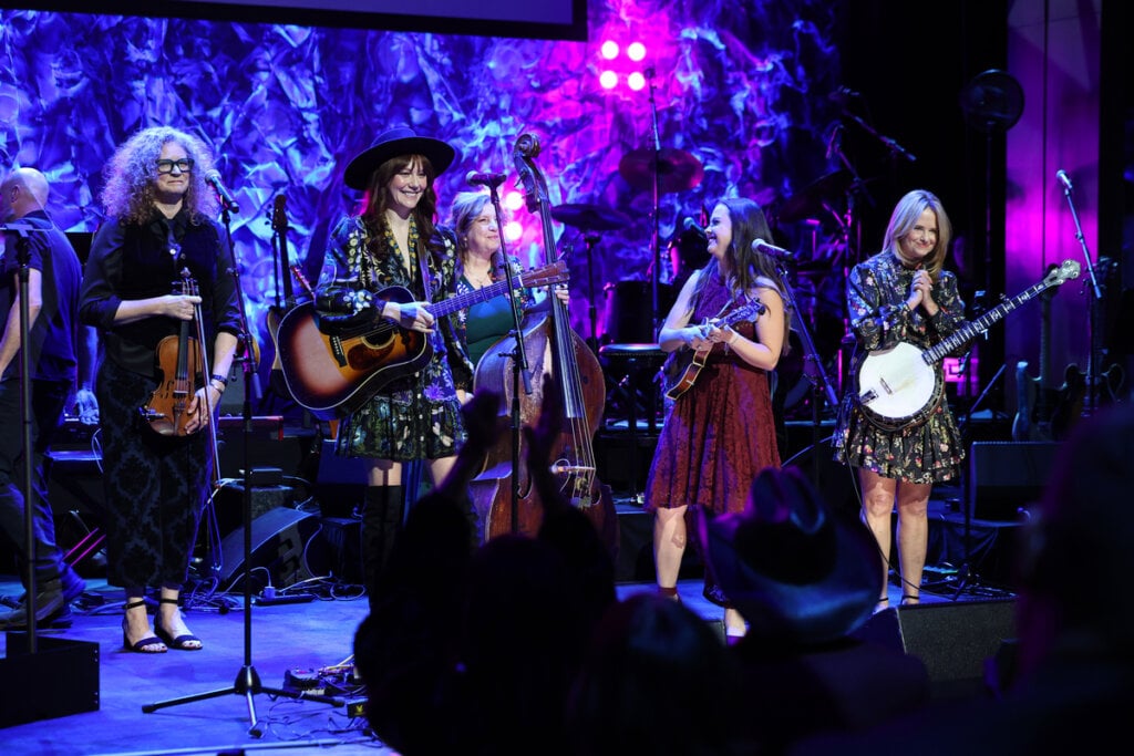 Becky Buller, Molly Tuttle, Missy Raines, Sierra Hull and Alison Brown of First Ladies of Bluegrass perform onstage during the Country Music Hall of Fame and Museum Class of 2026 Medallion Ceremony at Country Music Hall of Fame and Museum on October 18, 2026 in Nashville, Tennessee; Photo by Terry Wyatt/Getty Images for Country Music Hall of Fame and Museum